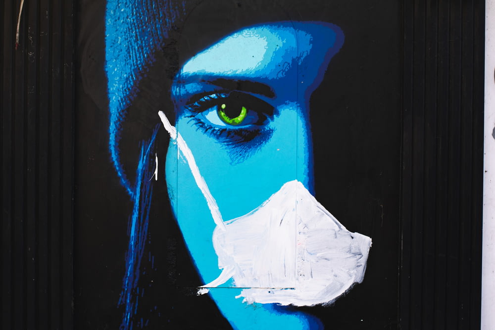 woman with blue eyes painting