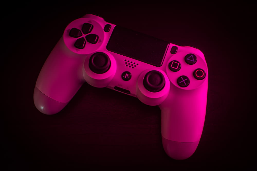 pink sony ps 4 game controller