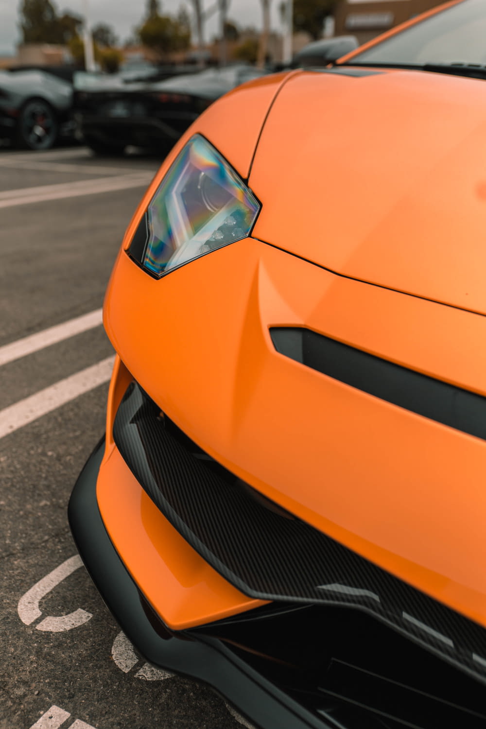orange car on the road