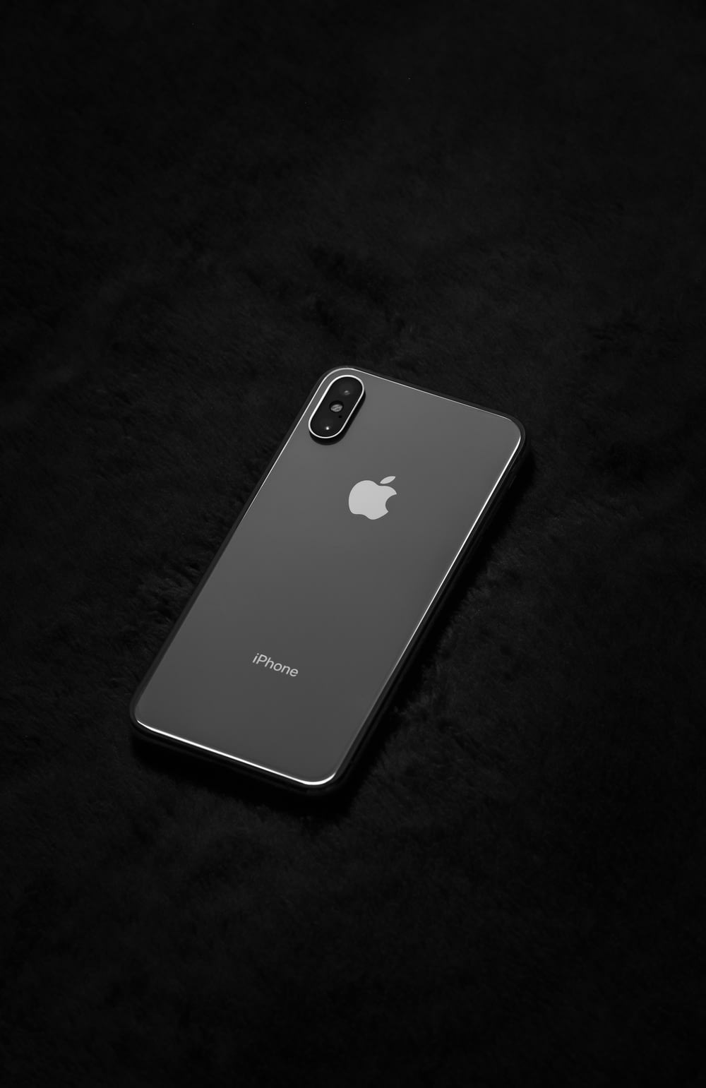 silver iphone 6 on black textile