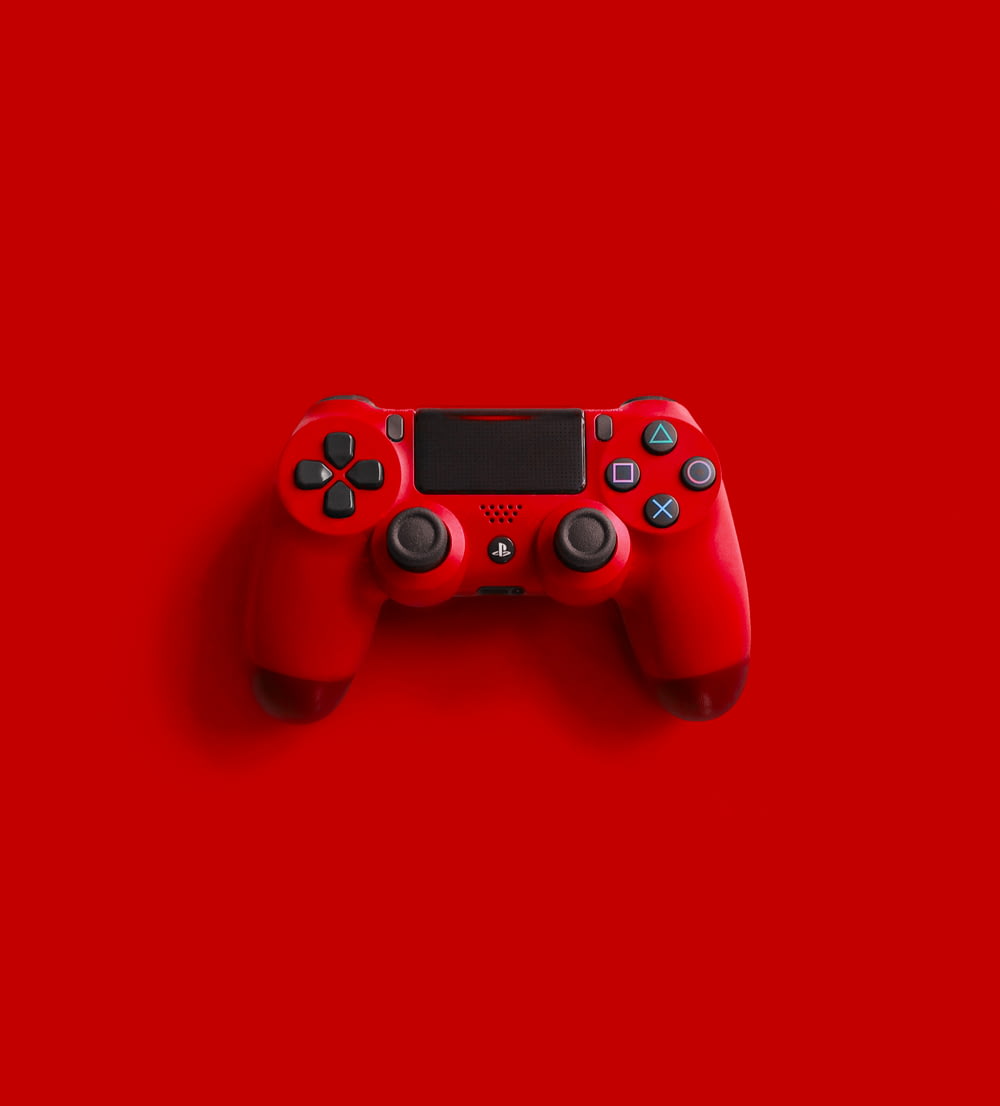 red sony ps 4 game controller