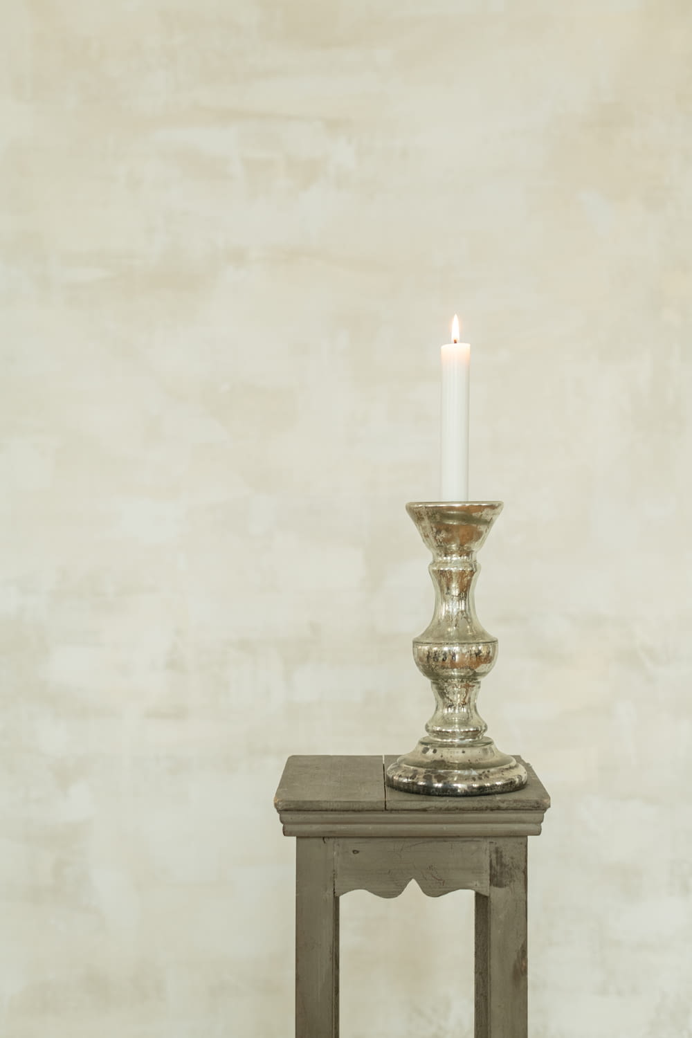 gold and white candle holder