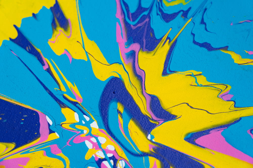 blue yellow and pink abstract painting