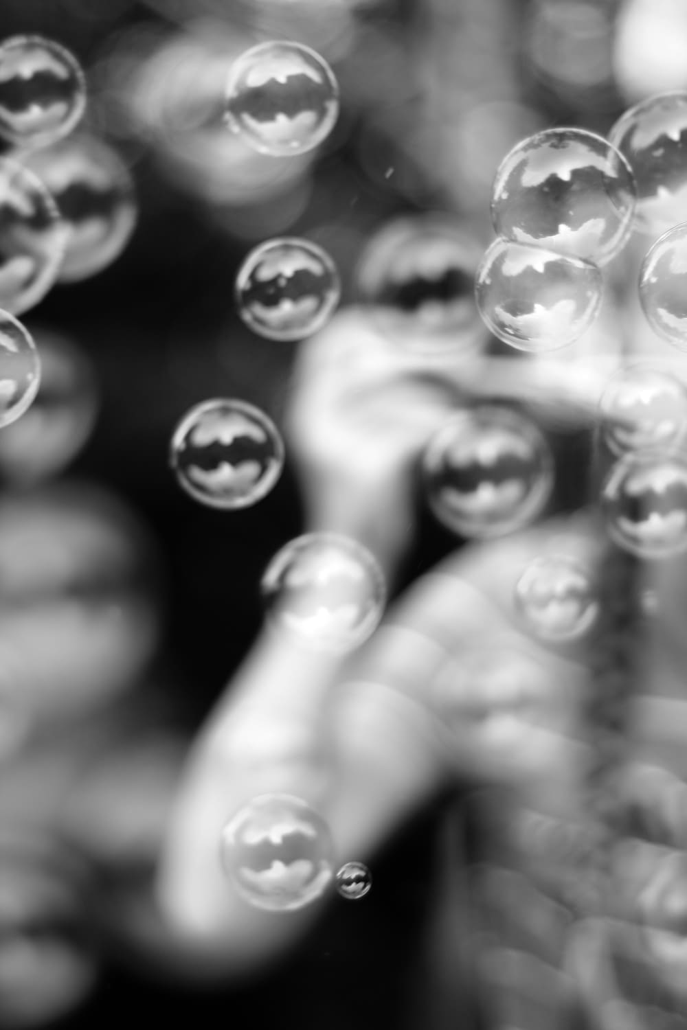 grayscale photo of water droplets