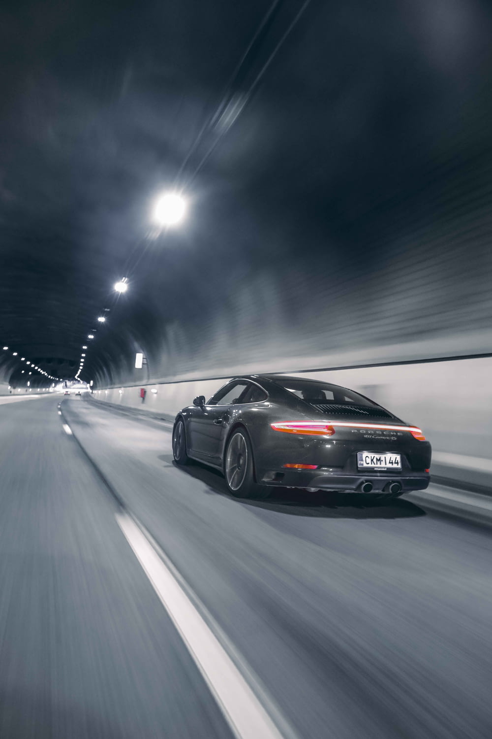 black audi r 8 on road during night time