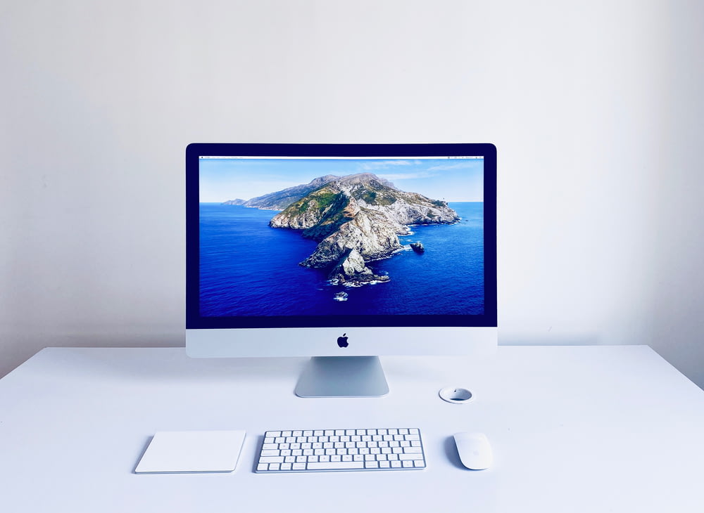 silver imac with apple magic keyboard and magic mouse
