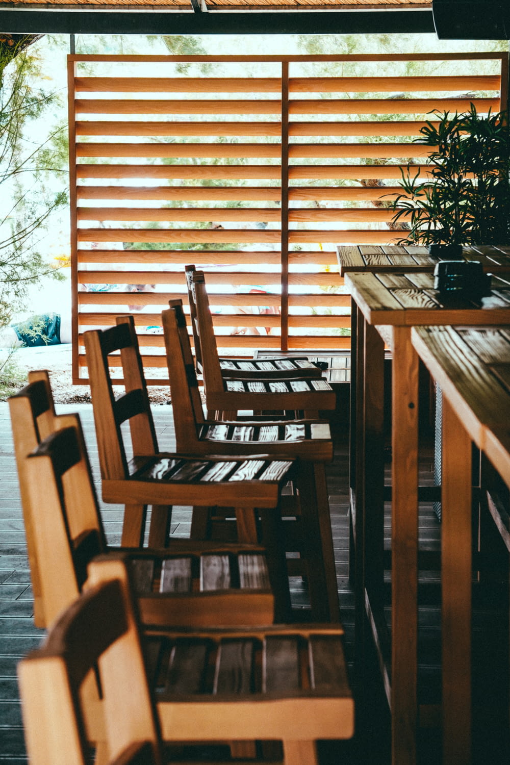brown wooden table and chairs