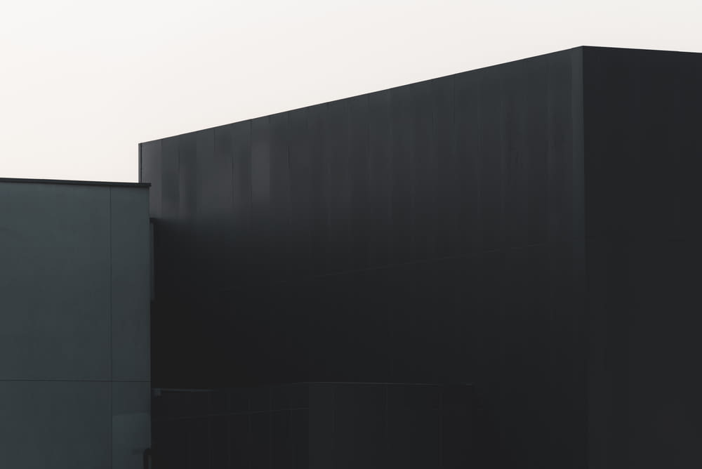black wooden wall during daytime
