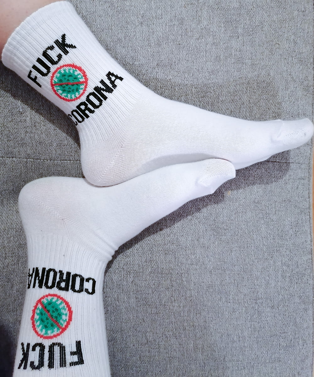 white and black adidas sock