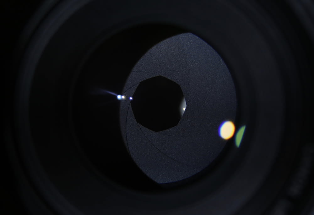 black round device in close up photography