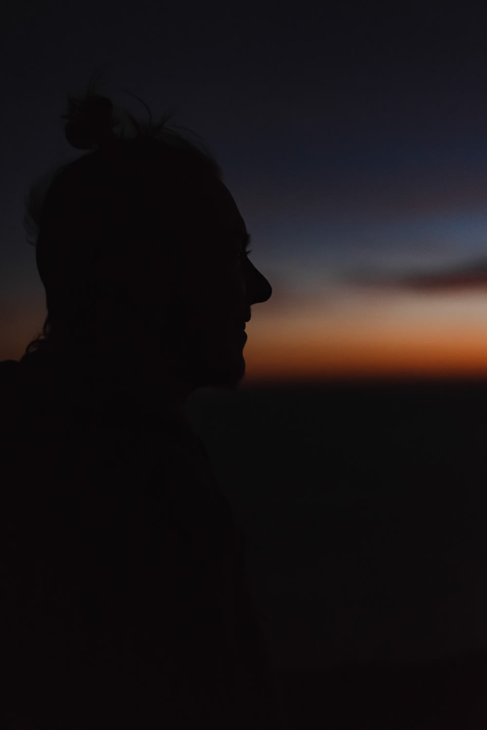 silhouette of person during sunset
