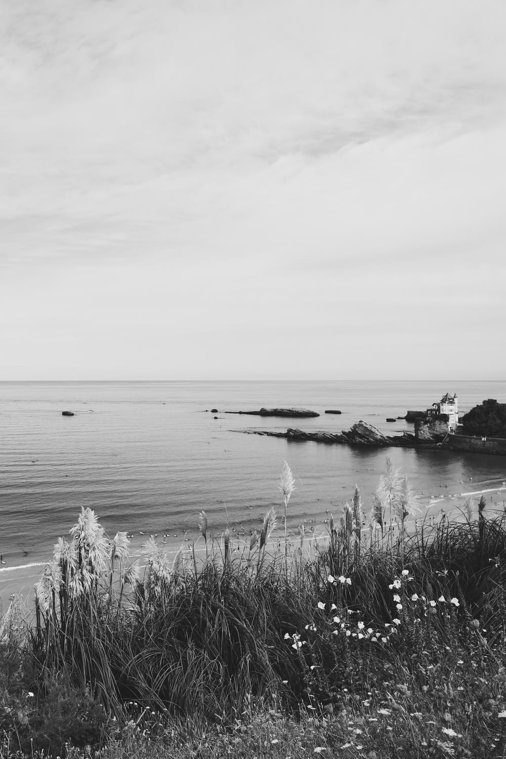 grayscale photo of boat on sea