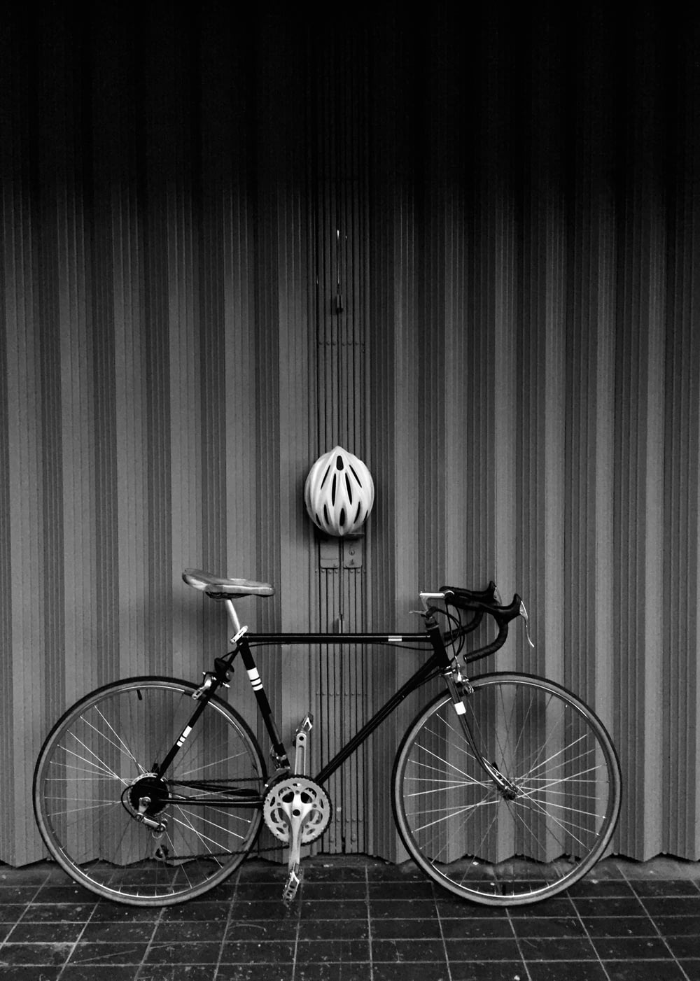 grayscale photo of road bike