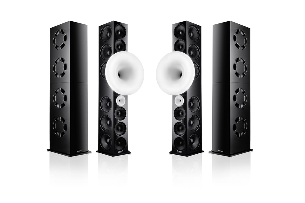 black and silver speakers on white surface