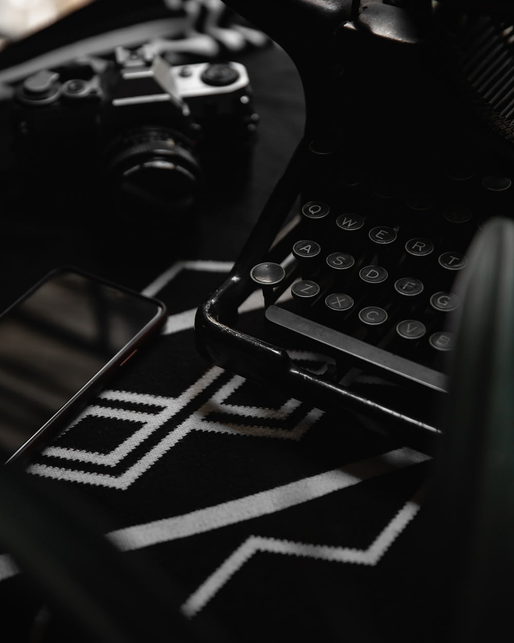 black and white typewriter on black and white textile