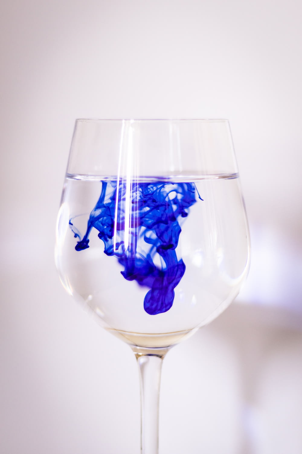 blue and white wine glass