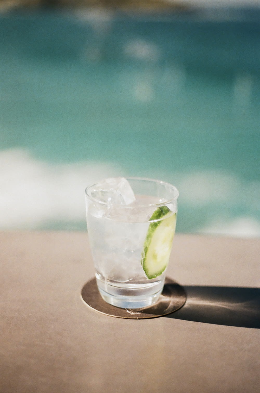 clear drinking glass with sliced lime