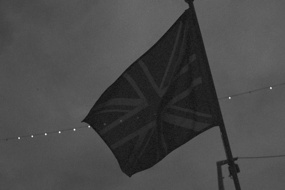 black and white flag on pole