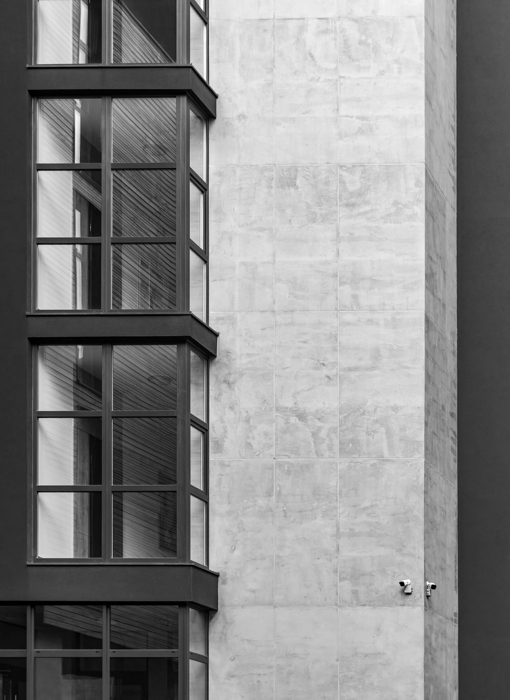 gray concrete building with glass window