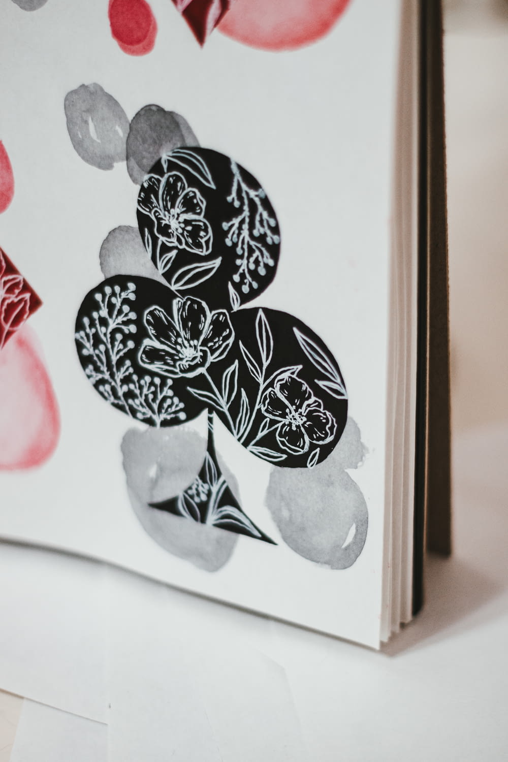 white and black floral painting