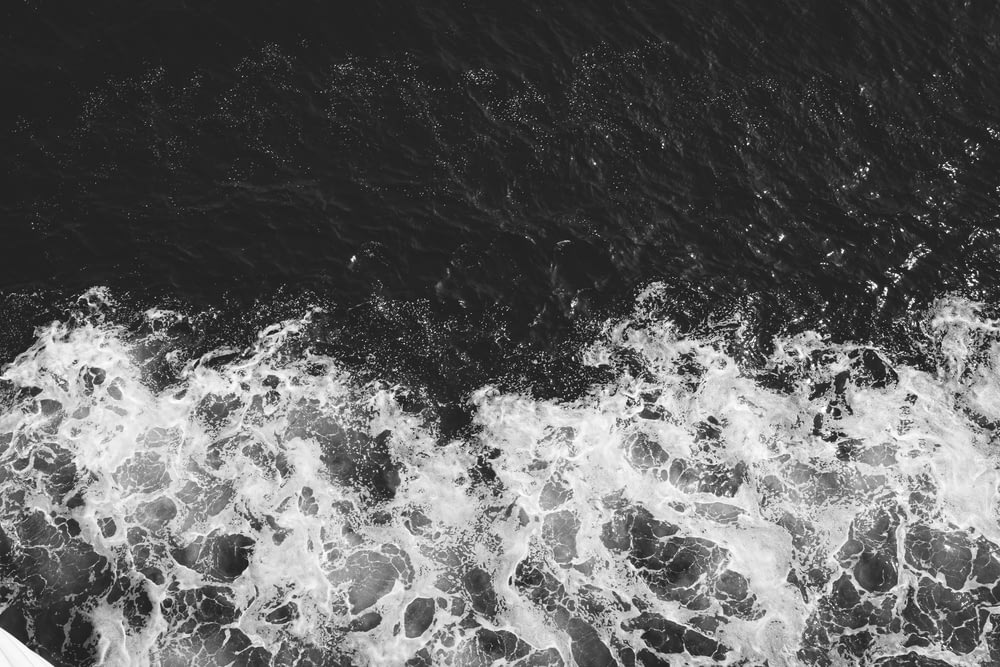 water splash on black and white