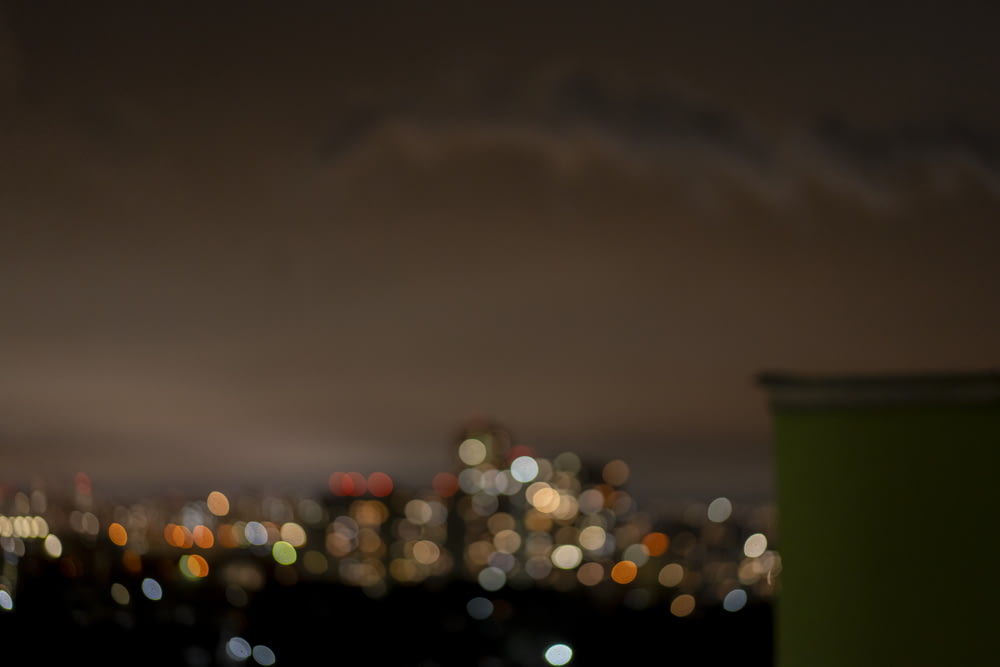 bokeh photography of city lights during night time