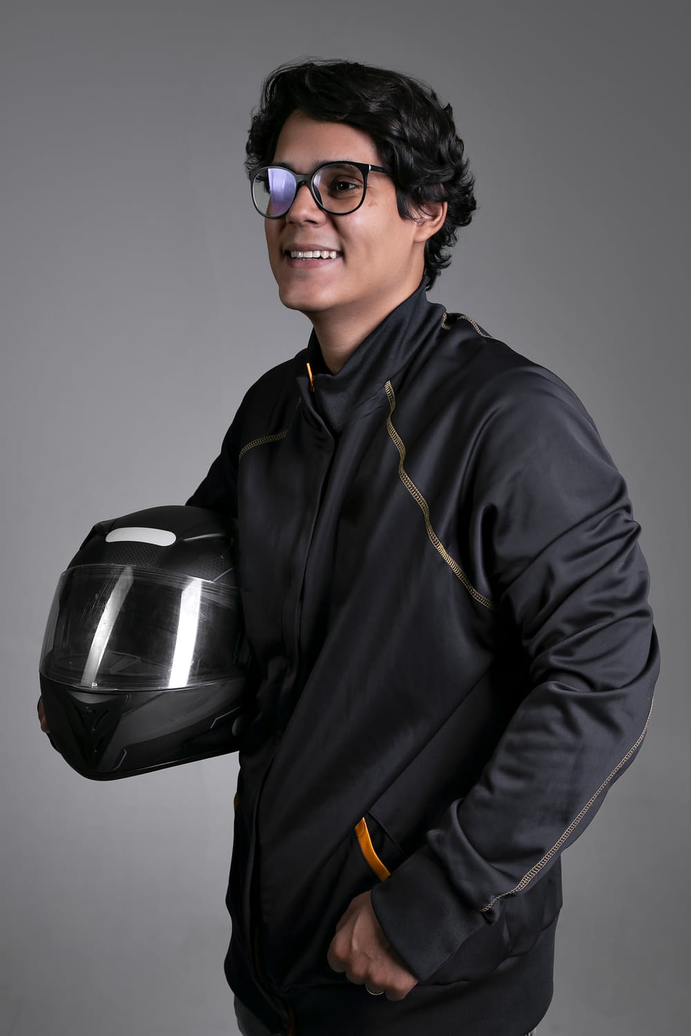 man in black jacket wearing black sunglasses