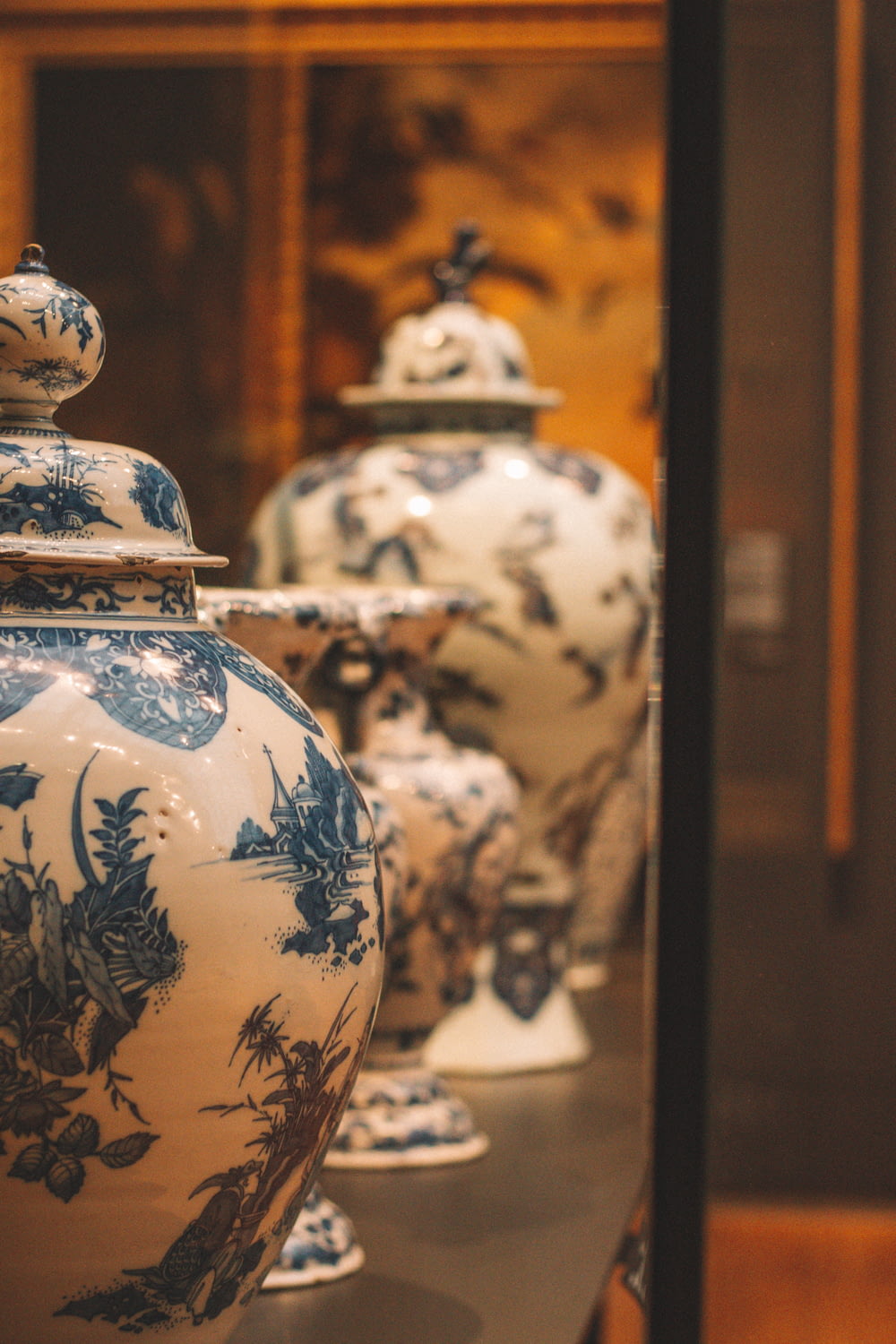 white and blue floral ceramic vase