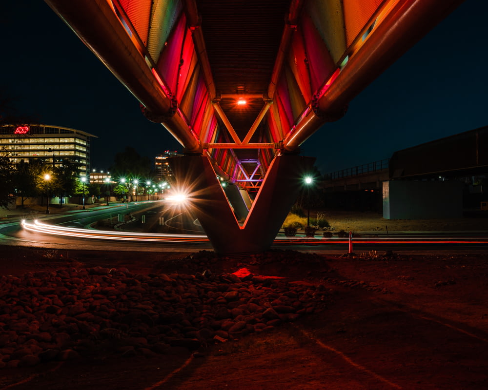 red and yellow lighted bridge during night time