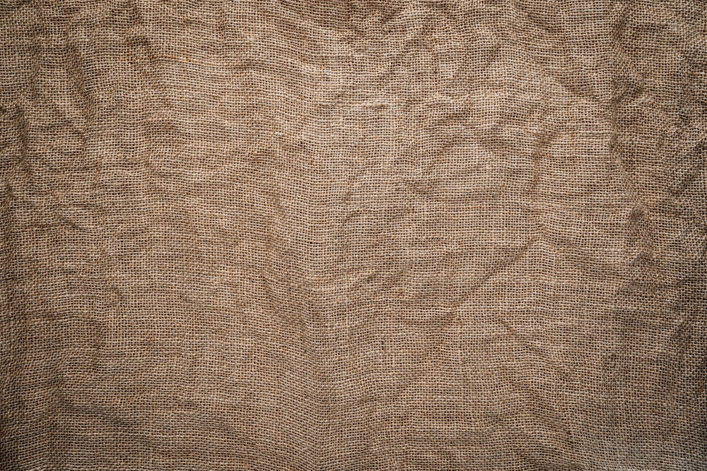 brown textile on brown wooden table