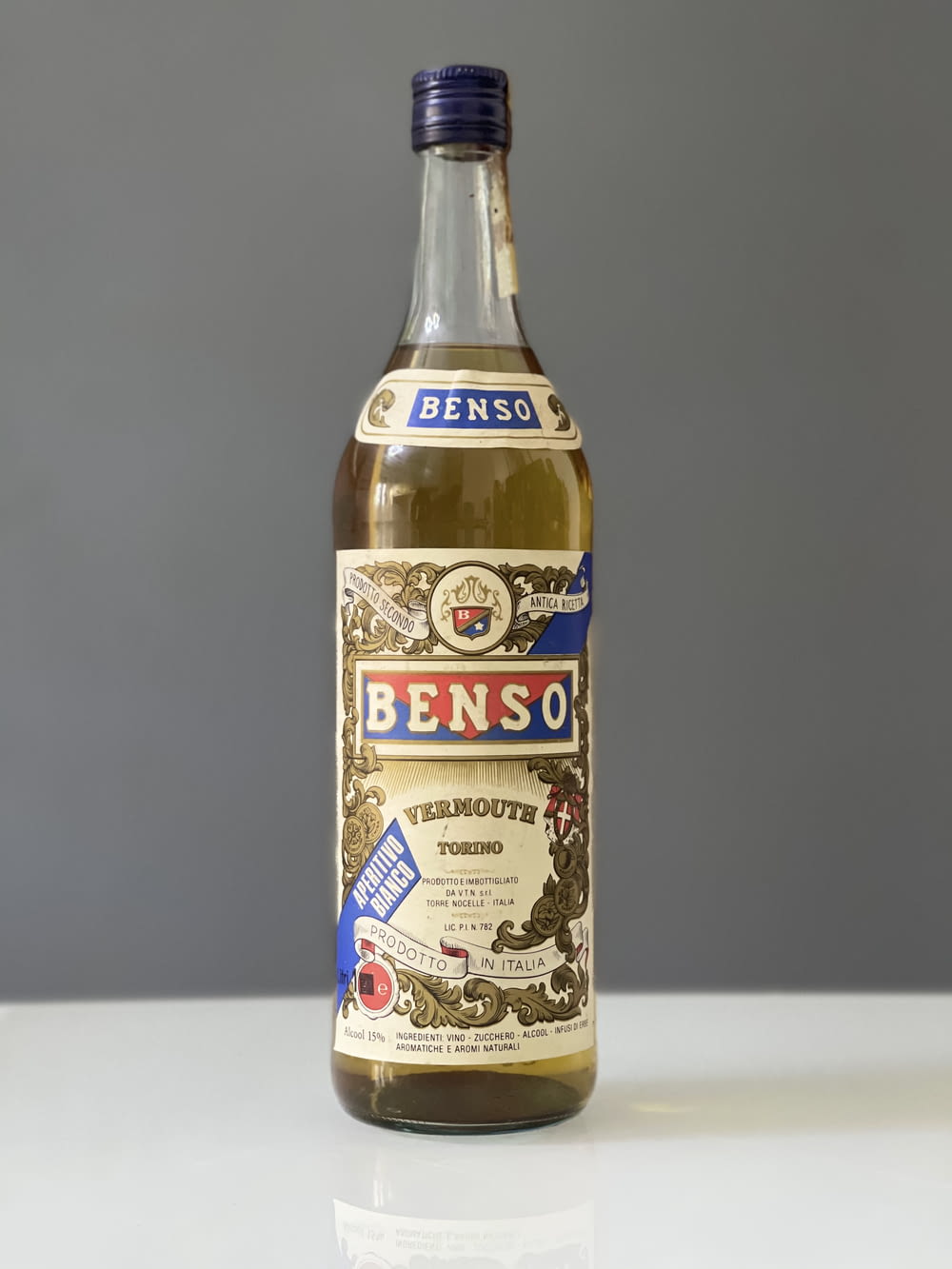 brown and white labeled bottle
