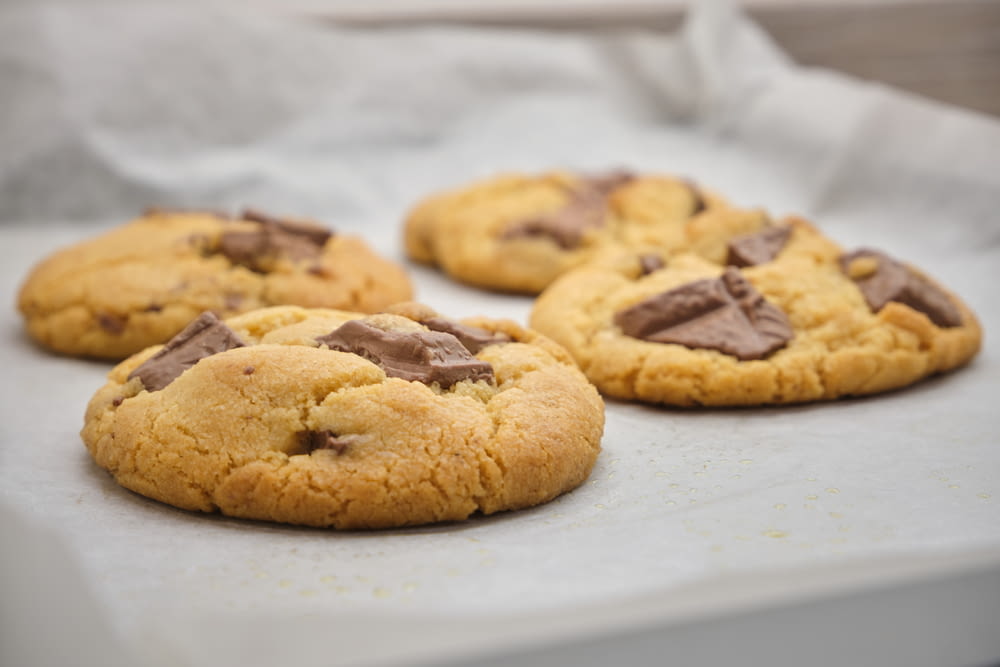 brown cookies on white paper