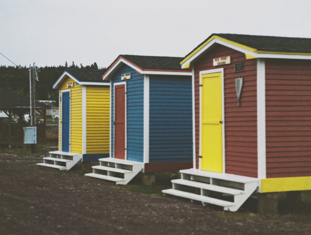 yellow blue and red wooden houses