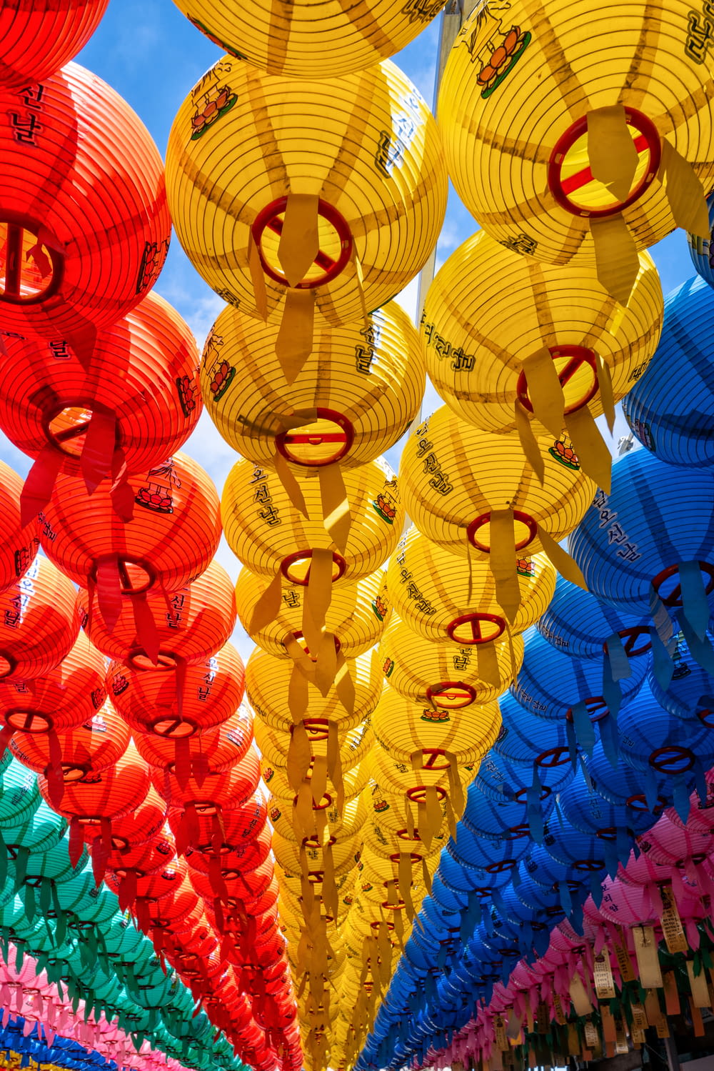 red blue and yellow paper lanterns