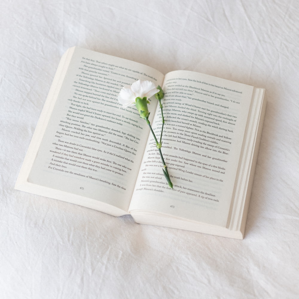 white flowers on book page