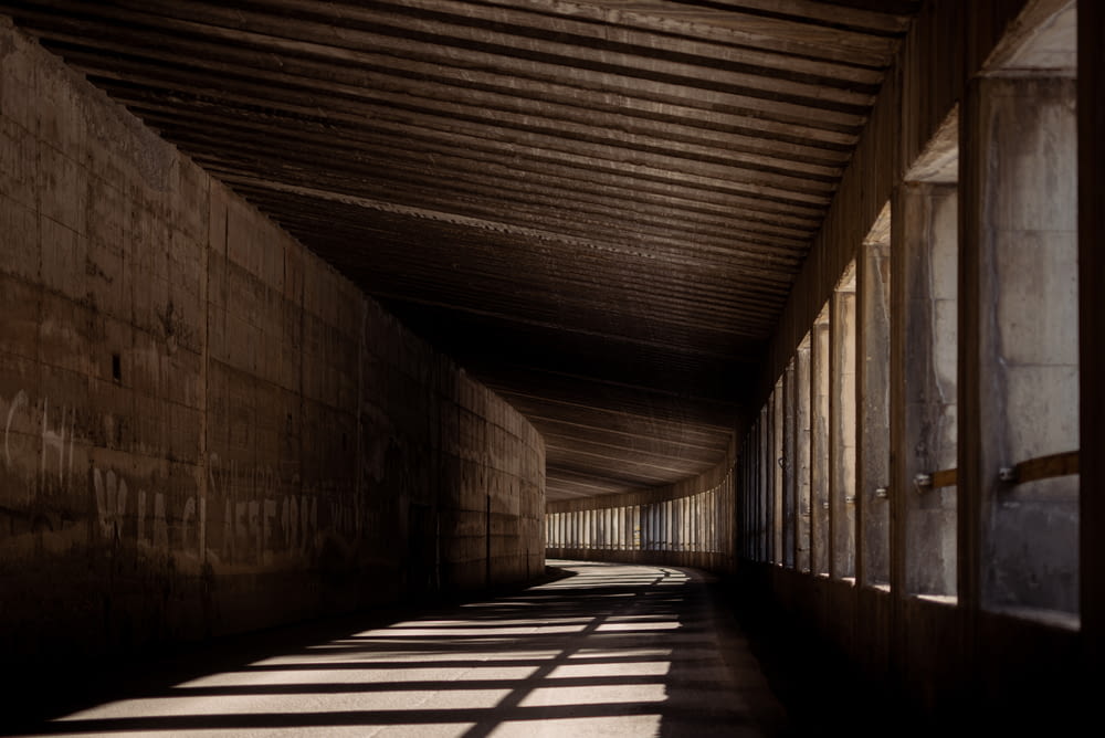 brown wooden tunnel during daytime