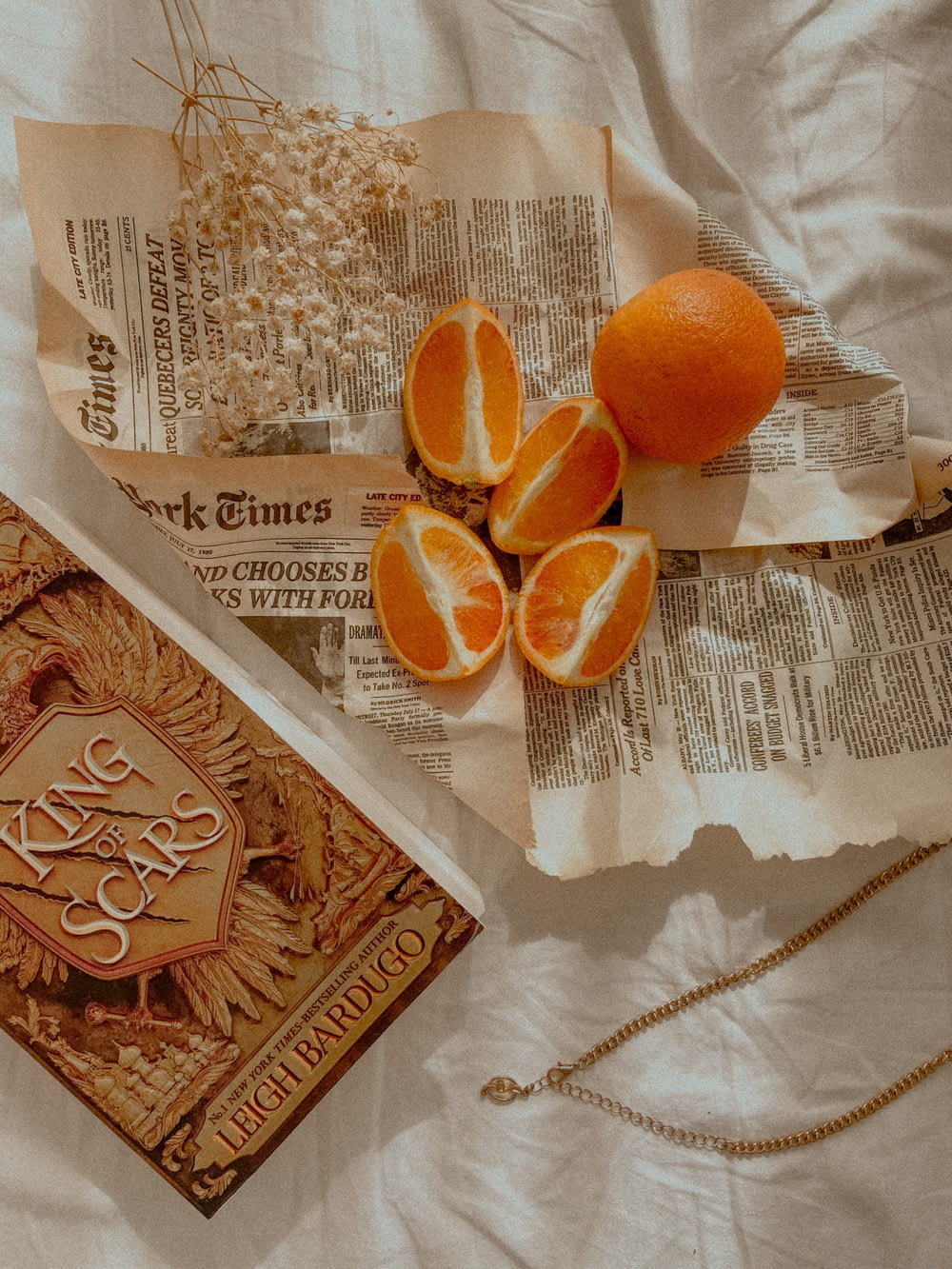 orange fruit on white textile