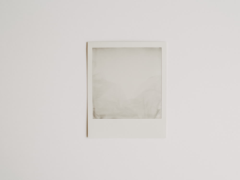white square frame on white wall