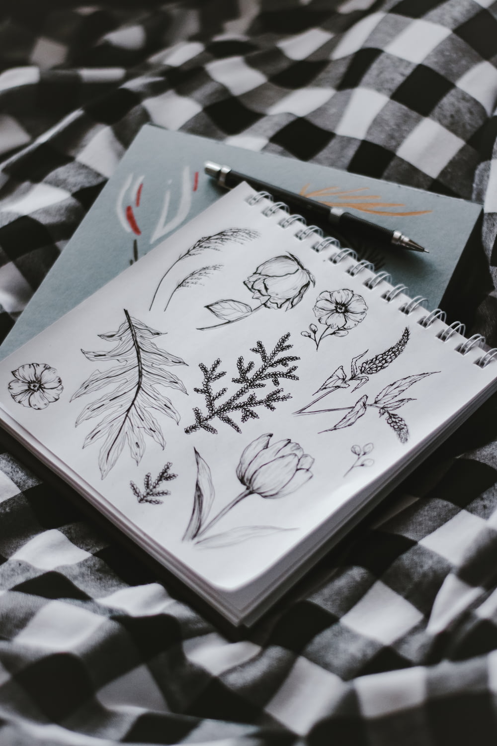 white and black floral book