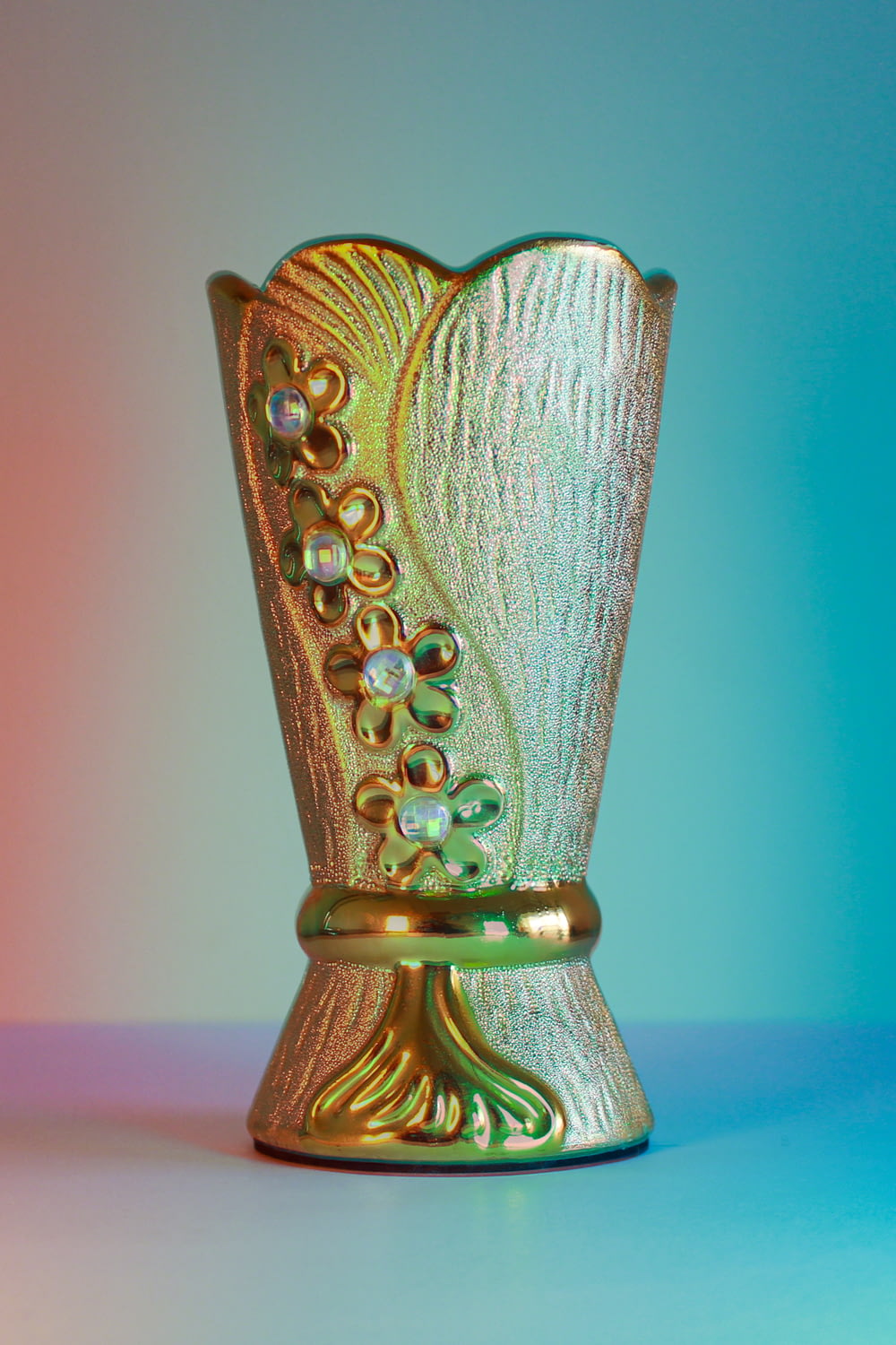 gold and green glass vase