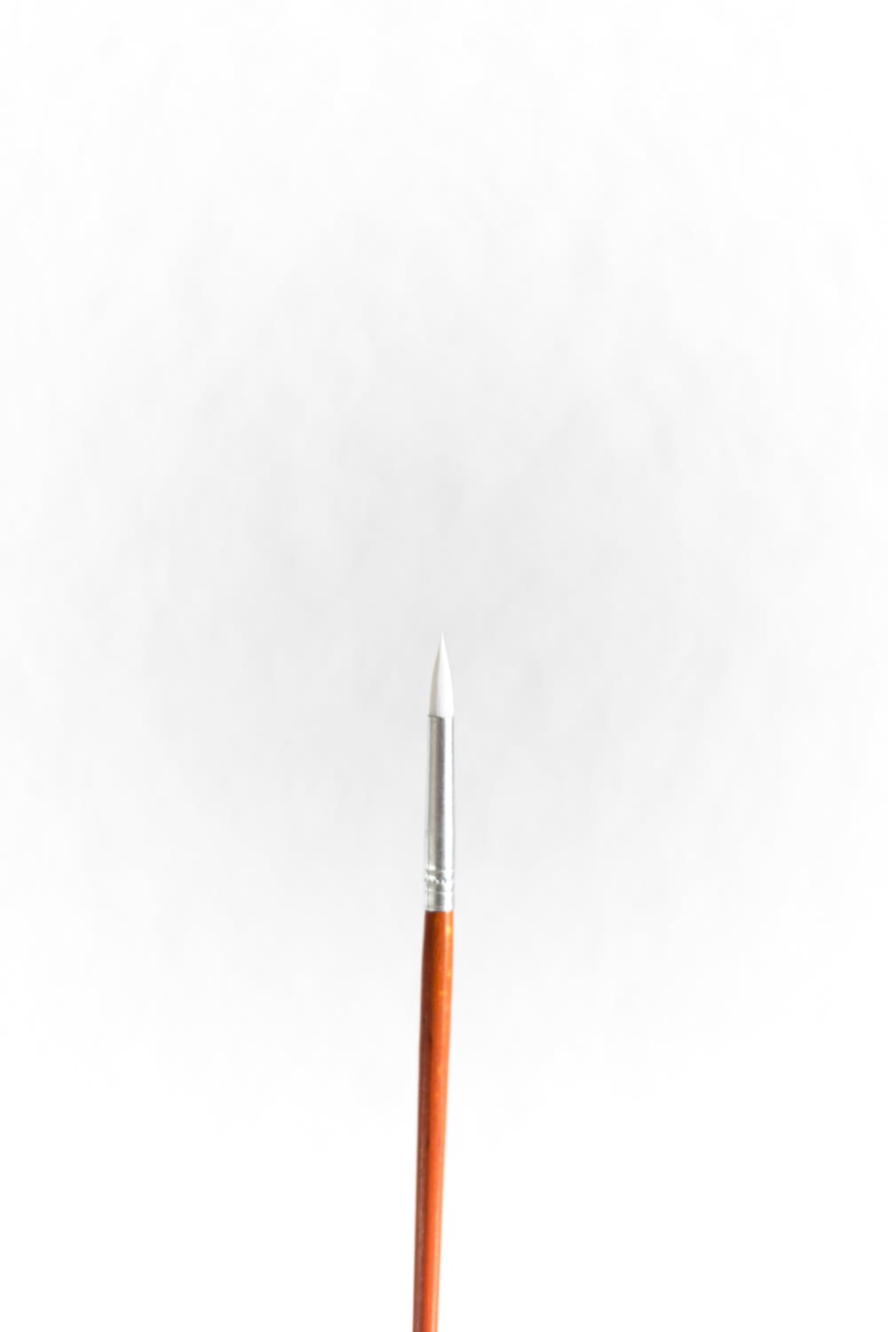 orange and silver click pen
