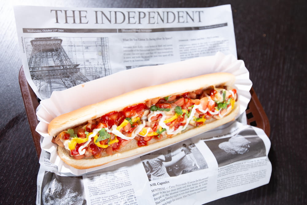 hotdog sandwich on white paper