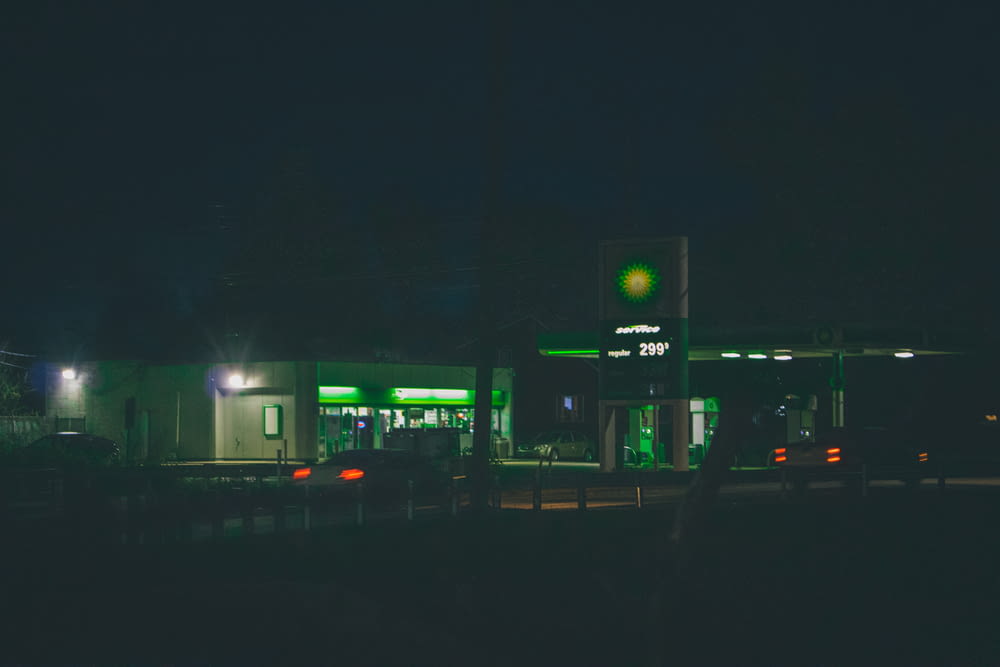white and green lighted building during night time