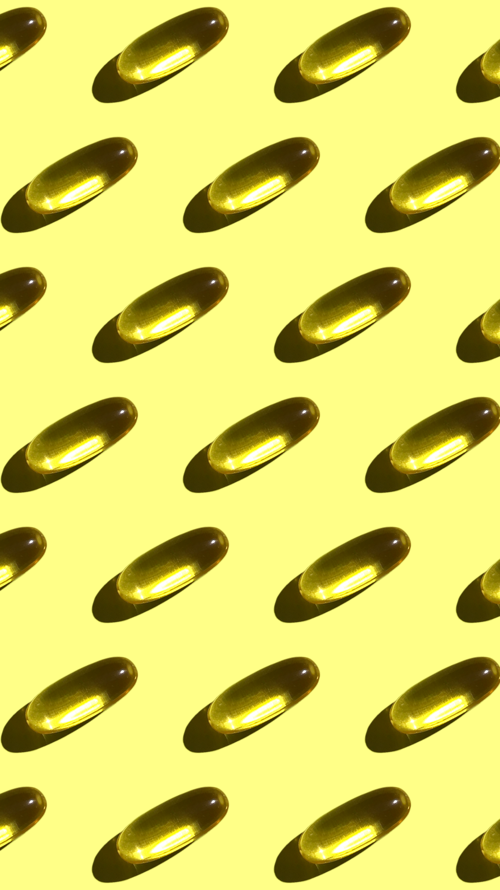 uno sfondo giallo con molte forme ovali