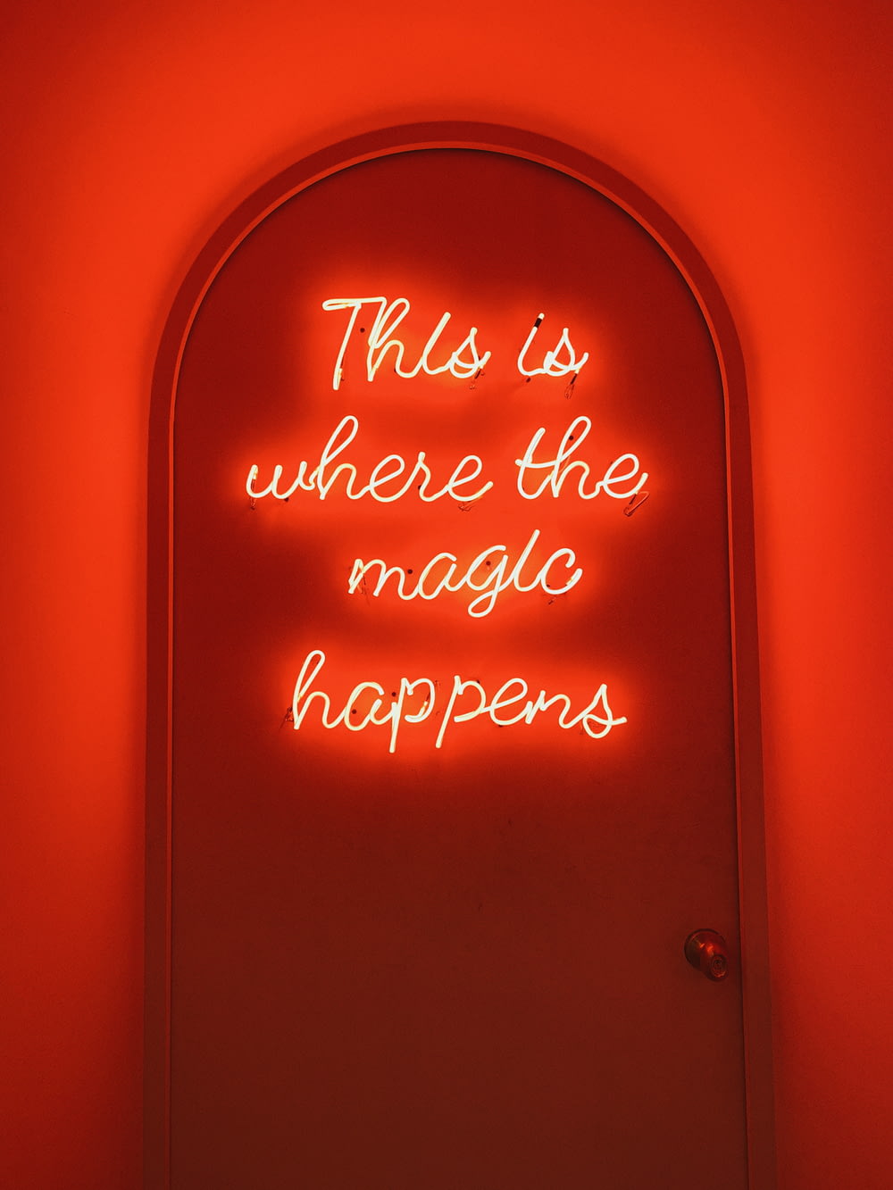 a neon sign that reads, this is where the magic happens