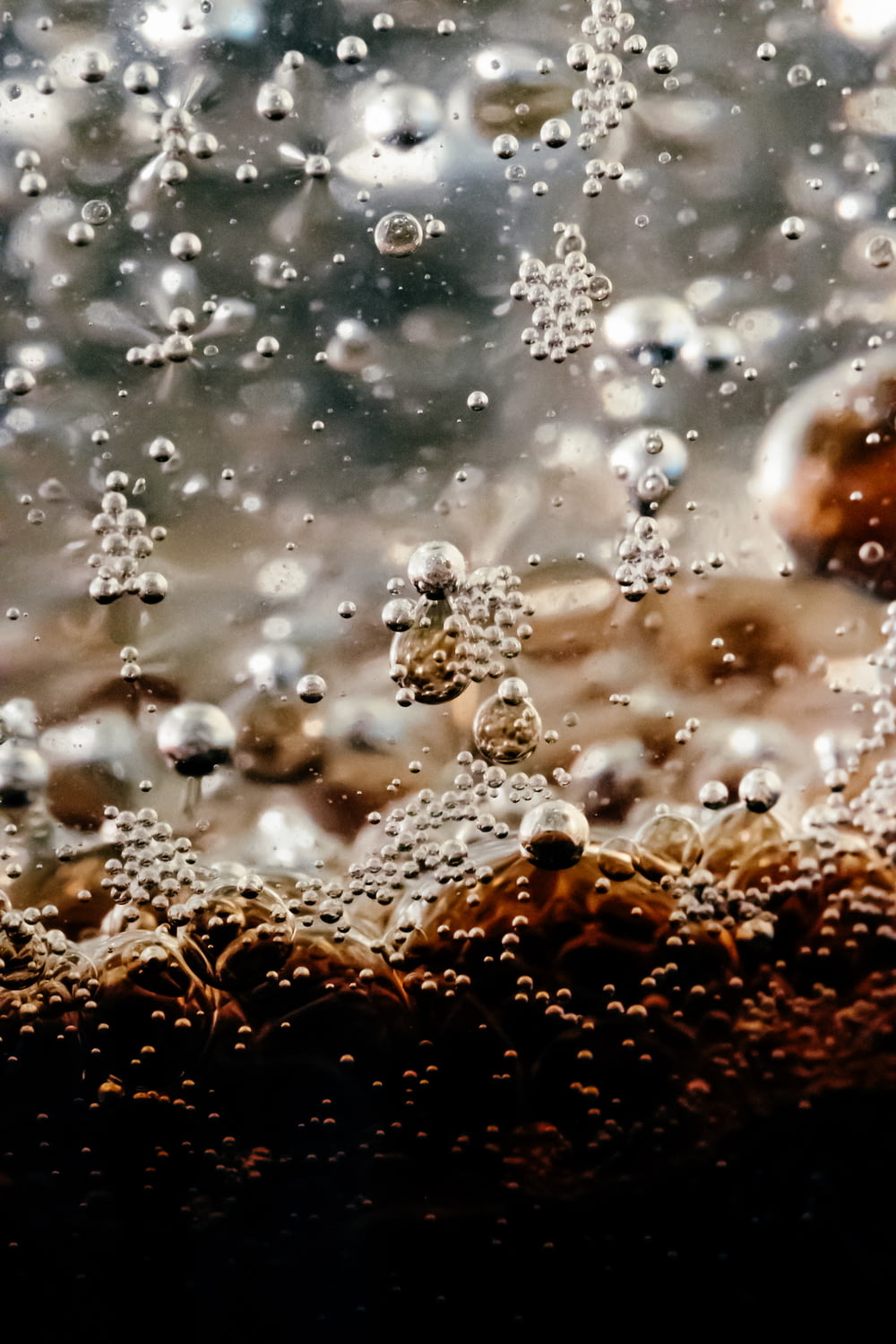 a close up of water bubbles on a surface
