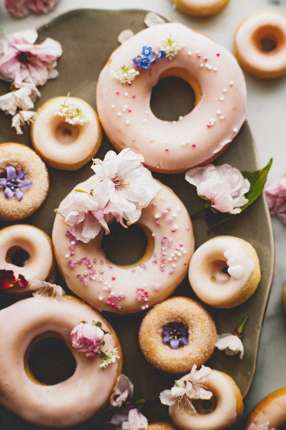 a bunch of doughnuts that are on a plate