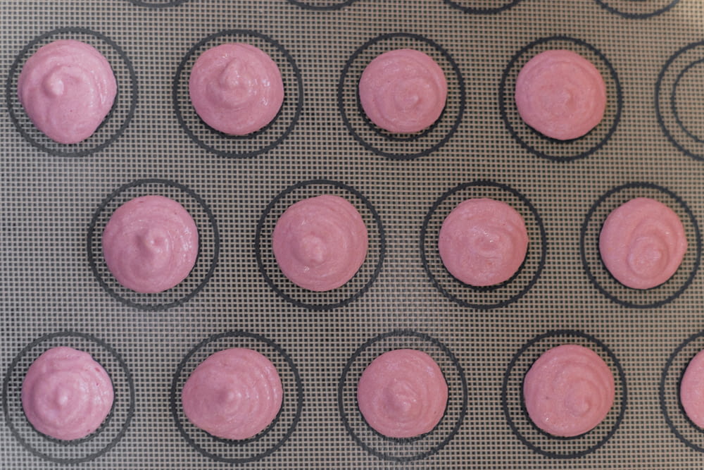 black and pink polka dot textile