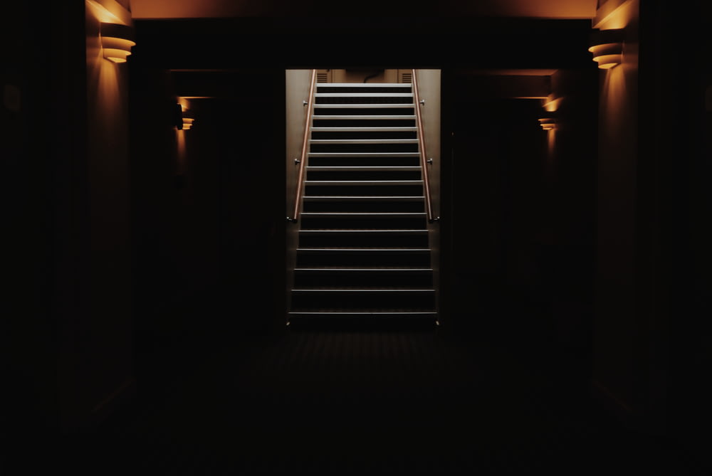 black staircase in dark room