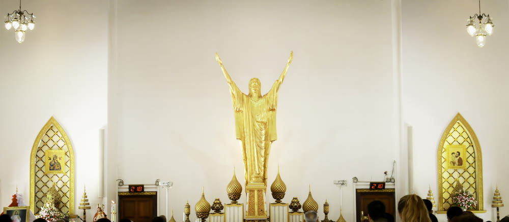 gold statue of a man